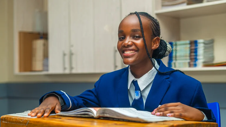 A Junior Secondary Learner in the Phase Four Campus in Grade Seven learning.jpg