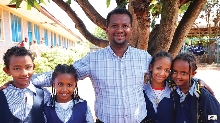 Tesfaye with students v2